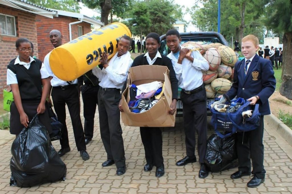 Rugby Recycled Kit Donation at a school
